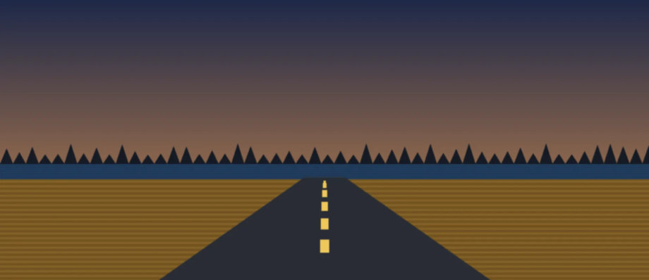 Highway past a Manitoba lake and spruce forest at dusk